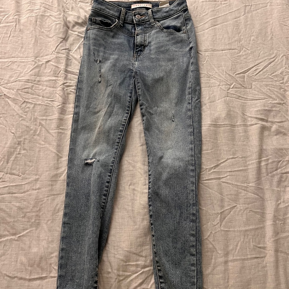 Skinny ripped light washed jeans